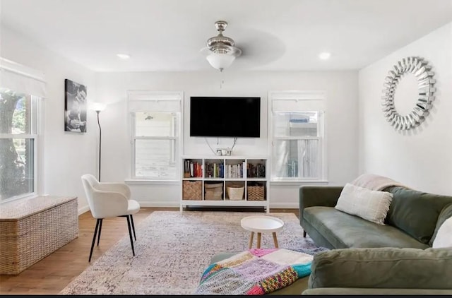 4217 Winfield Ave, Fort Worth, TX 76109 - living area featuring plenty of natural light, ceiling fan, wood finished floors, and baseboards