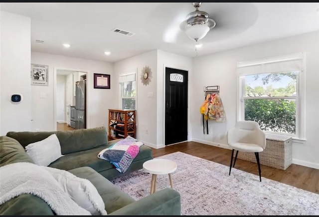 4217 Winfield Ave, Fort Worth, TX 76109 - living area featuring wood finished floors, plenty of natural light, baseboards, and recessed lighting