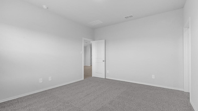 spare room with carpet flooring