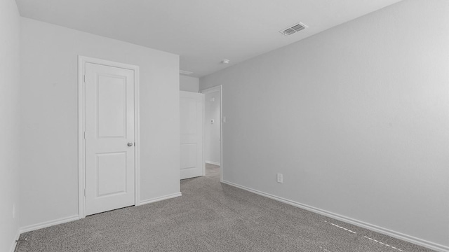 unfurnished bedroom with carpet flooring