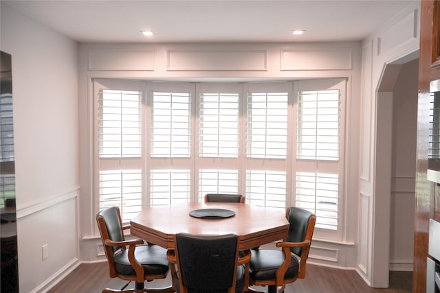 dining area with dark hardwood / wood-style floors