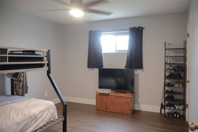 bedroom featuring hardwood / wood-style floors and ceiling fan