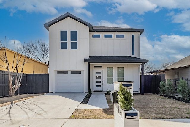 view of front of property with a garage