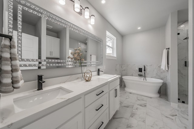 bathroom featuring plus walk in shower and vanity