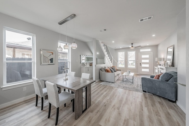 dining room featuring light hardwood / wood-style flooring and ceiling fan