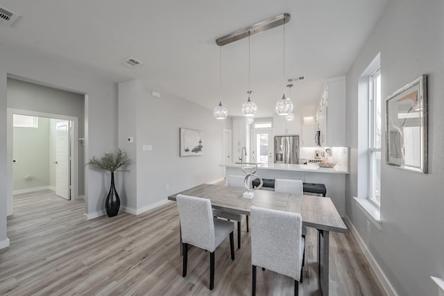 dining room featuring light hardwood / wood-style floors