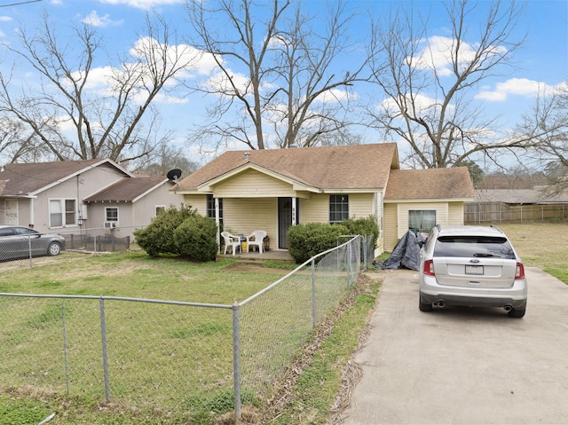 ranch-style house featuring a porch and a front lawn