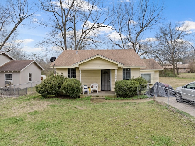 view of front of property with a porch, cooling unit, and a front lawn