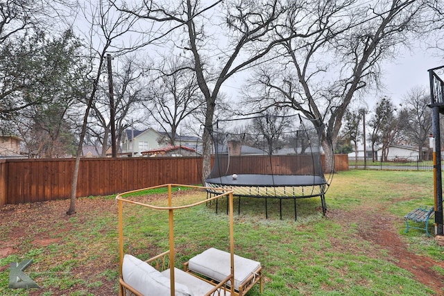 view of yard featuring a trampoline