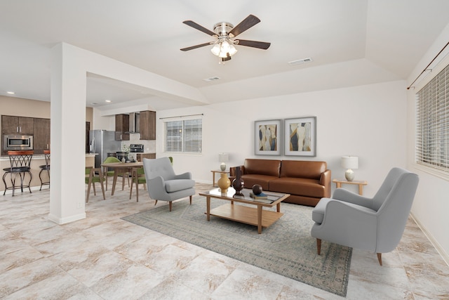 living room featuring ceiling fan