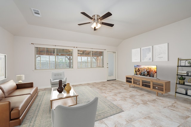 living room featuring vaulted ceiling and ceiling fan