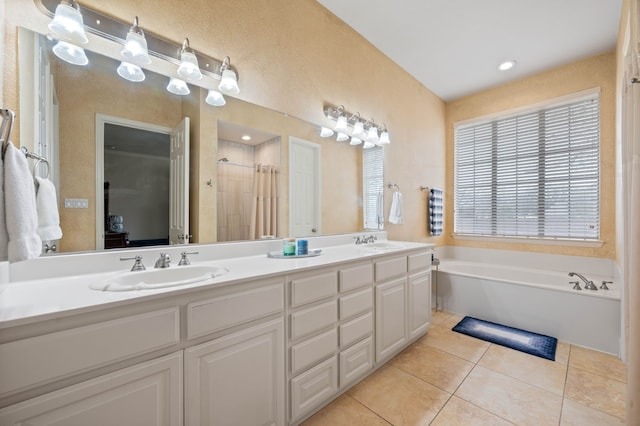 bathroom featuring vanity, plus walk in shower, and tile patterned flooring