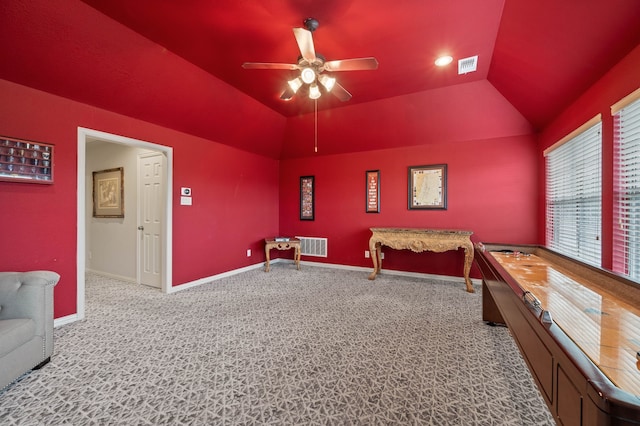 bedroom featuring ceiling fan, lofted ceiling, and carpet flooring