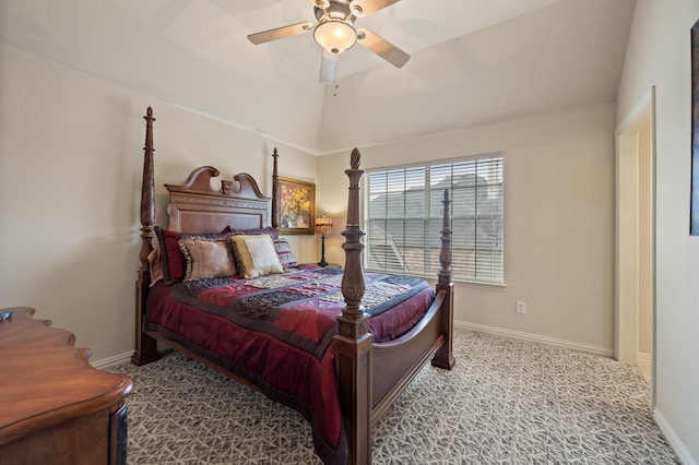 carpeted bedroom with vaulted ceiling and ceiling fan