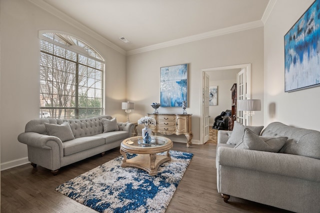 living room featuring crown molding and dark hardwood / wood-style flooring