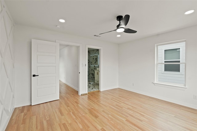 empty room featuring ceiling fan, recessed lighting, visible vents, baseboards, and light wood-type flooring