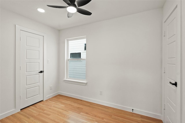 unfurnished bedroom with light wood-type flooring, ceiling fan, baseboards, and recessed lighting