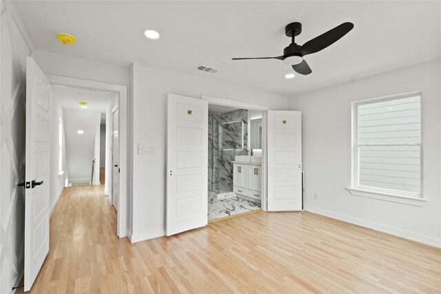 empty room featuring light wood-style floors, recessed lighting, baseboards, and a ceiling fan