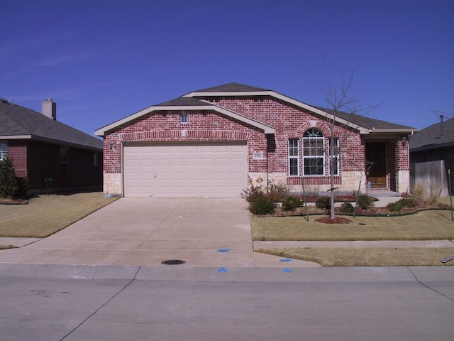 single story home featuring a garage