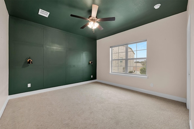 4413 Murphy Ln, Carrollton, TX 75010 - empty room with ceiling fan, carpet, baseboards, and visible vents