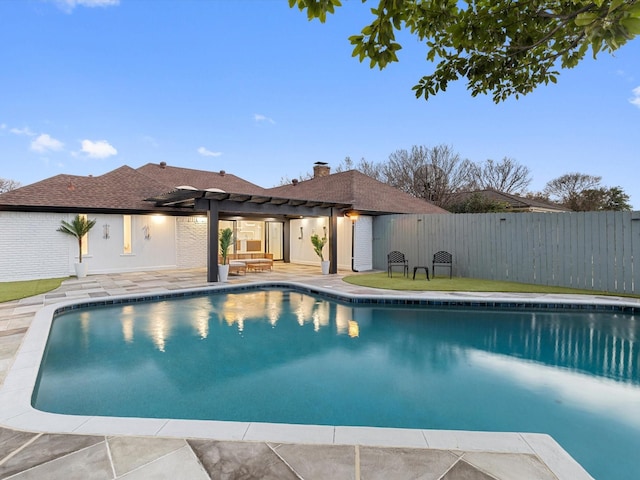 view of swimming pool with a pergola and a patio area