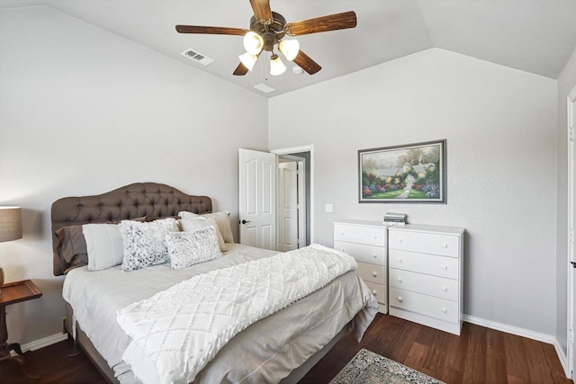 bedroom featuring lofted ceiling, dark hardwood / wood-style floors, and ceiling fan