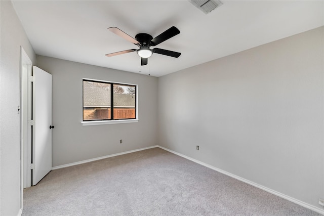 unfurnished bedroom featuring ceiling fan and light colored carpet