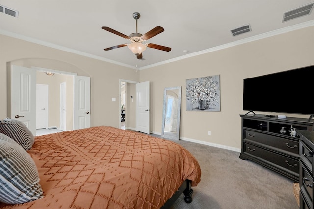 bedroom featuring crown molding, ceiling fan, and carpet floors