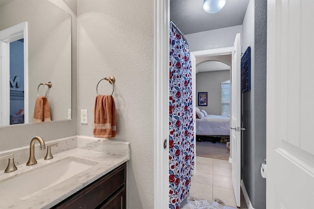 bathroom featuring vanity and tile patterned floors