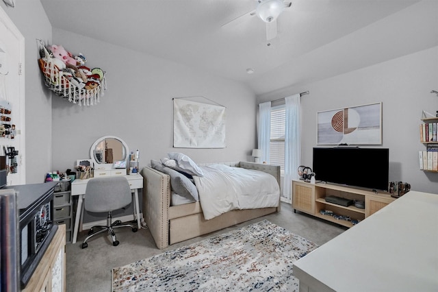 bedroom with ceiling fan and vaulted ceiling