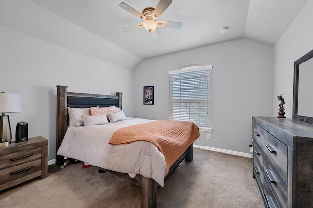 bedroom with ceiling fan, lofted ceiling, and carpet floors