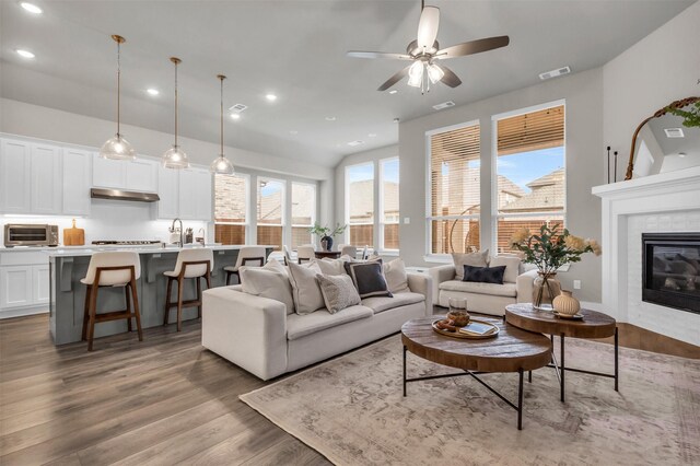 bedroom featuring vaulted ceiling, carpet flooring, and baseboards