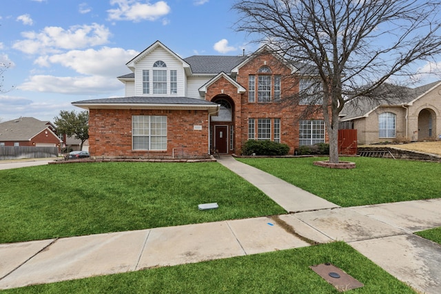 front facade with a front lawn