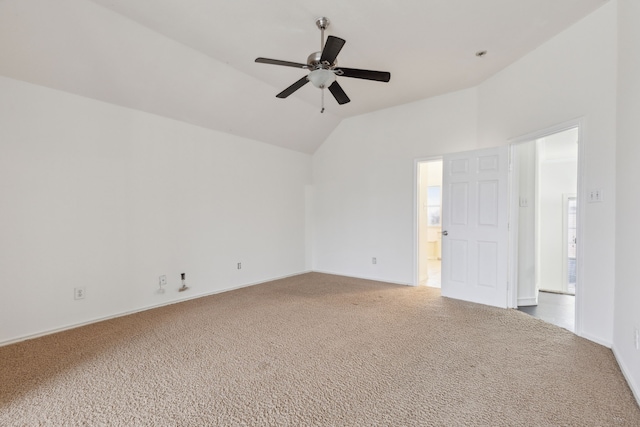 spare room with carpet, lofted ceiling, and ceiling fan