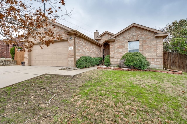 ranch-style home with a garage and a front lawn