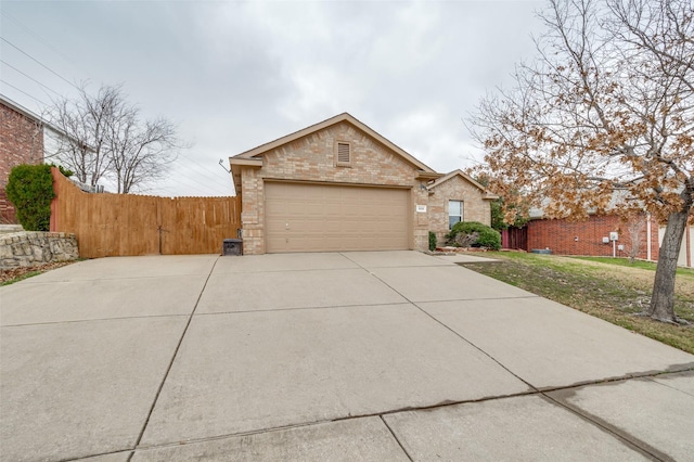 single story home with a garage