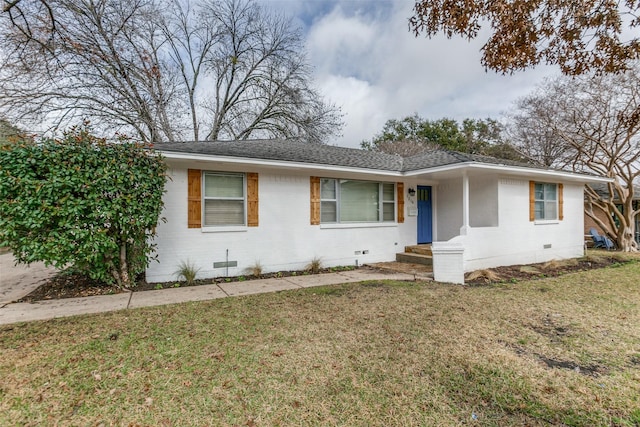 ranch-style house with a front yard