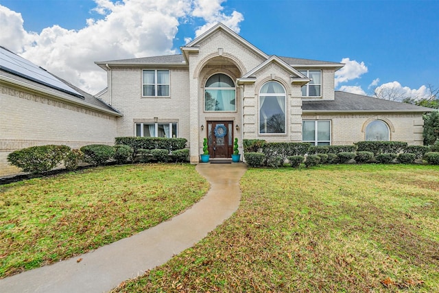 view of front property with a front yard