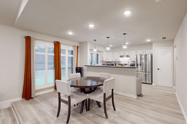 6808 Westglen Dr, Fort Worth, TX 76133 - dining area featuring sink and light wood-type flooring