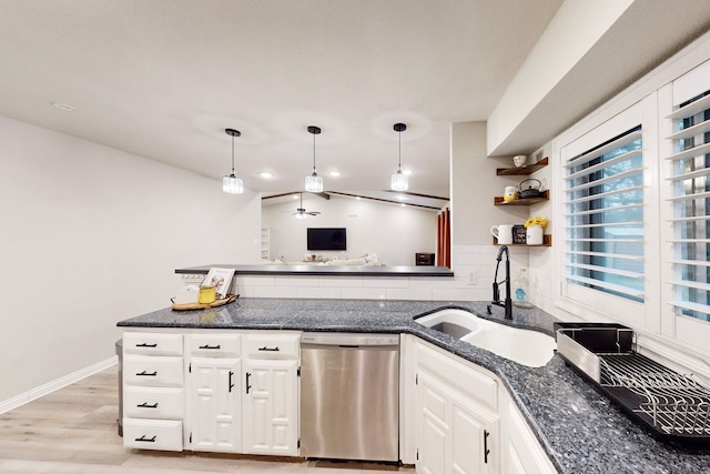 6808 Westglen Dr, Fort Worth, TX 76133 - kitchen featuring pendant lighting, sink, white cabinets, stainless steel dishwasher, and light hardwood / wood-style flooring