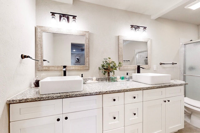 6808 Westglen Dr, Fort Worth, TX 76133 - bathroom featuring vanity, an enclosed shower, and toilet