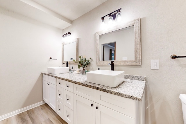 6808 Westglen Dr, Fort Worth, TX 76133 - bathroom with vanity and hardwood / wood-style floors