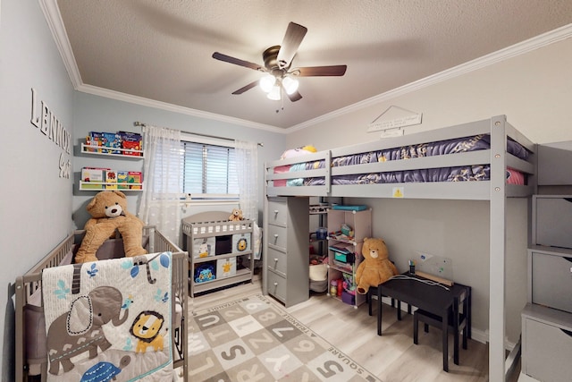 6808 Westglen Dr, Fort Worth, TX 76133 - bedroom featuring ornamental molding, ceiling fan, a textured ceiling, and light hardwood / wood-style floors