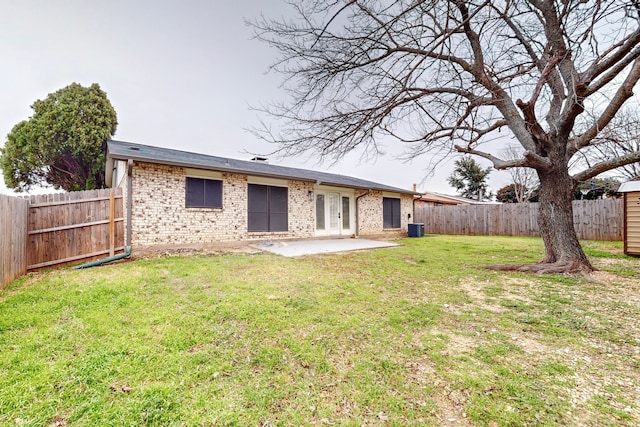 6808 Westglen Dr, Fort Worth, TX 76133 - rear view of house with a yard, central AC, and a patio