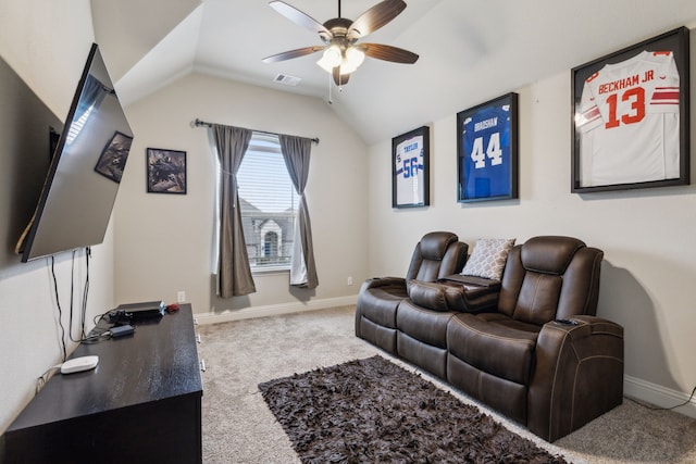 carpeted cinema featuring lofted ceiling, a ceiling fan, visible vents, and baseboards