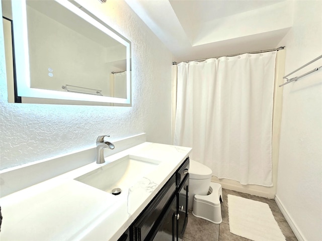 full bathroom with vanity, shower / tub combo, tile patterned flooring, and toilet