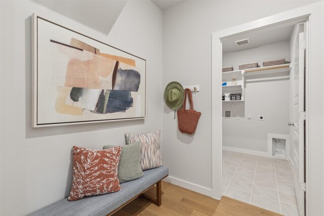 interior space with light hardwood / wood-style floors