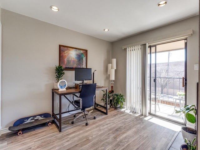 office area with light wood-style flooring and recessed lighting