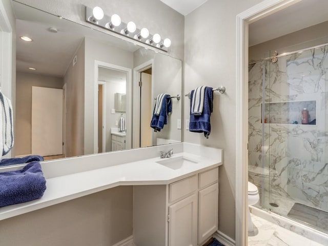 full bath featuring toilet, recessed lighting, vanity, marble finish floor, and a marble finish shower