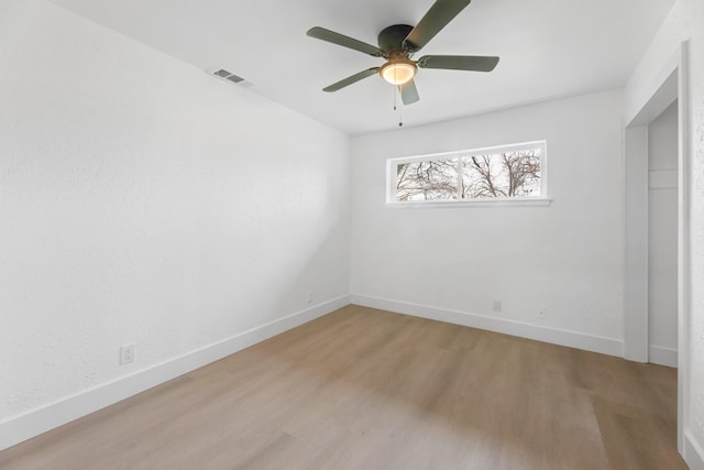 unfurnished bedroom featuring light hardwood / wood-style flooring and ceiling fan